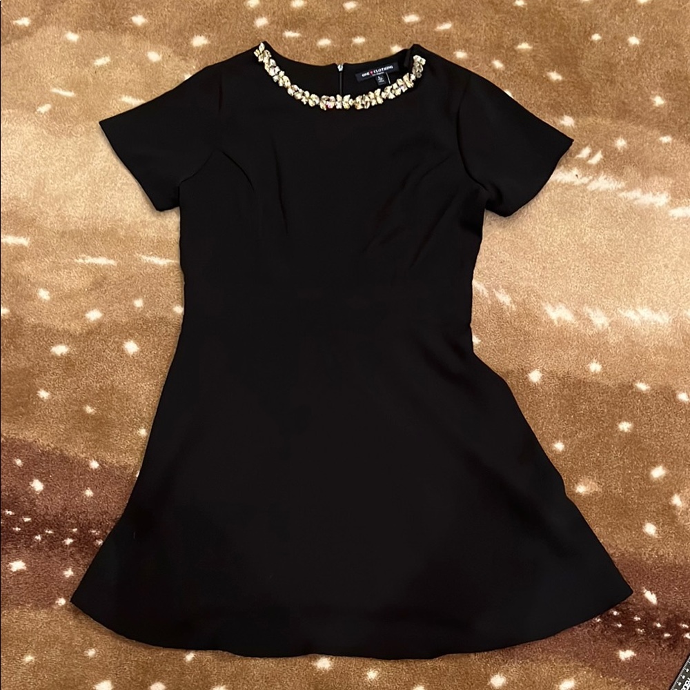 Elegant Black Dress with Embellished Neckline